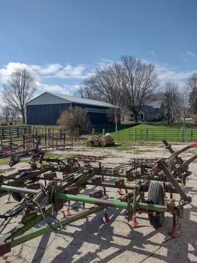 15ft Glencoe cultivator with Midwest harrows, ready to use. Low hours but looks weathered from sitti...