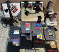 Nintendo Entertainment System with Controllers and Games Lot