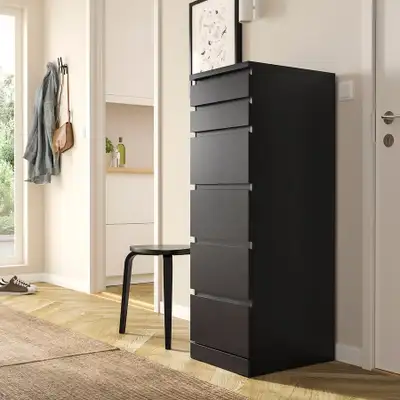 Ikea tall dresser with six drawer in clean and very good used condition. The top flips open with a m...