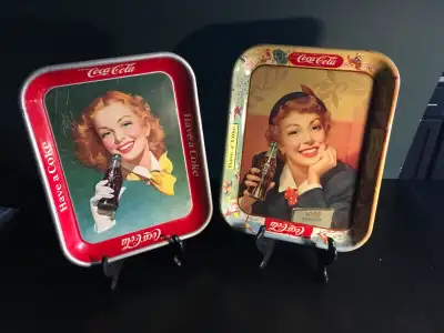 Two original 1950's Coca-Cola trays in very good condition. $100.00 each