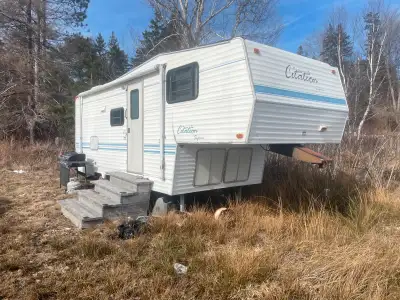 1997 citation 5 th wheel camper for sale needs work on bathroom roof shower is not there either but...