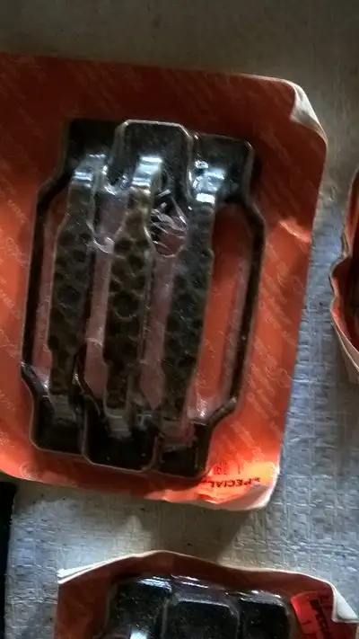 Assorted handles/hinges in antique brass., View more