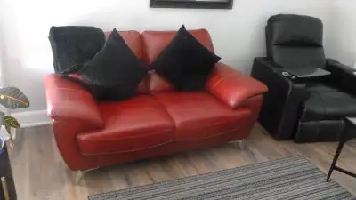 Red soft leather love seat
