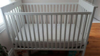 Pretty convertible baby's crib (or toddler's bed) with mattress