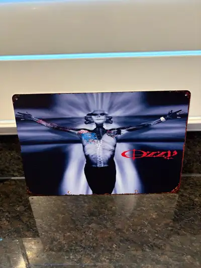 Ozzy Osbourne Down to Earth Metal Sign 8 x 12 new $20.00 Pick up in South Windsor near Walmart Check...