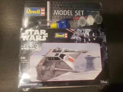 Brand new sealed star wars snowspeeder 1:52 model kit. The paint and glue that comes with the kit mi...