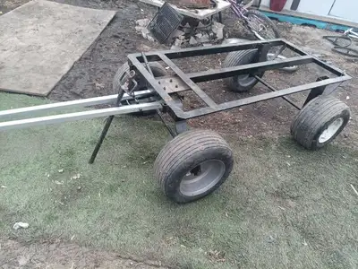 This heavy-duty cart is available and ready for your hauling needs, featuring a sturdy frame and dur...