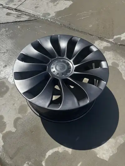 Selling a full set of OEM 21” Uberturbine wheels from a Tesla Model Y Performance 2022. ✔ Profession...