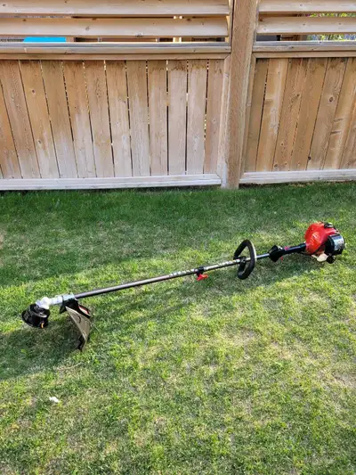 TORO 2 Stroke String Trimmer 25.4 cc 18in cutting width Straight shaft, which provides extended reac...