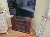 Corner tv stand and large screen LG tv for sale. 