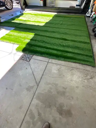 Turf, has small pieces cut out, but still fairly large, View more