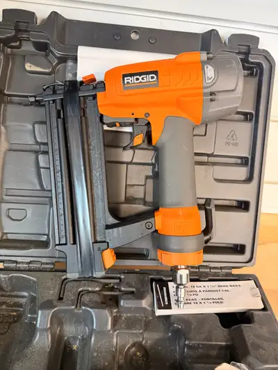 Rigid 18 gauge air nailer. Tool works great. Only issue is the nail compartment needs to be held clo...