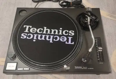 Technics SL-1200MK2 black direct drive turntables. Includes brand new technics slip mat and a techni...