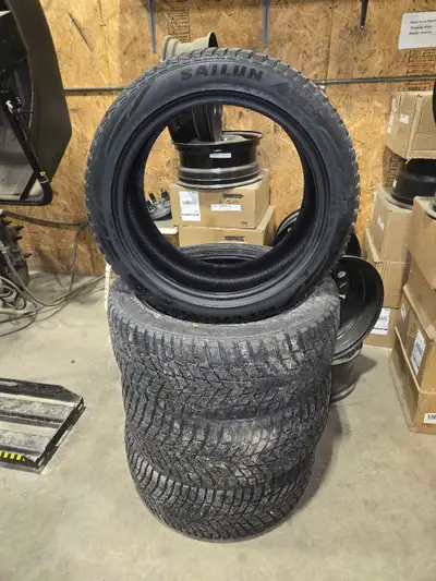 Selling a set of 4 BRAND NEW 245/45R18 Sailun Ice Blazer Winter Tires. These tires have less than 50...