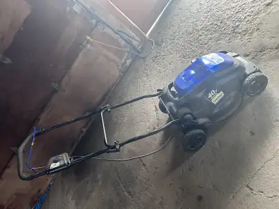 Selling a kobalt battery push mower comes with one battery and charge $200 located west end of Ottaw...
