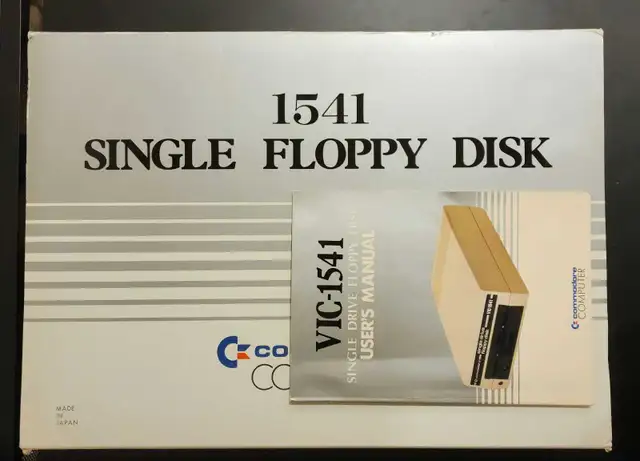 Commodore floppy disk drive 1541 with box and floppy disks in Other in Calgary - Image 2