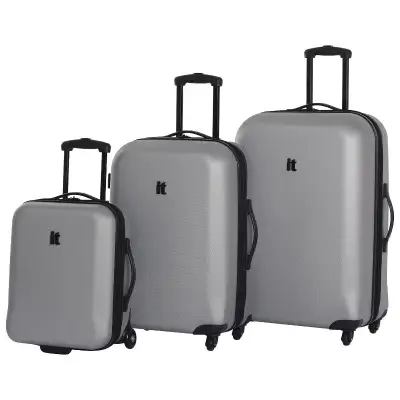 it luggage Galactic 3-Piece Hard Side 4-Wheeled Expandable Luggage Set - Silver Traveling across the...