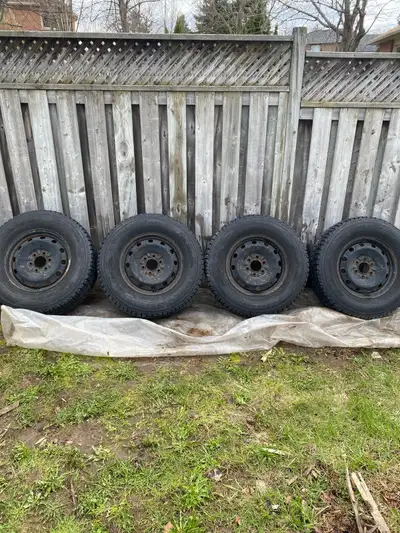 Brand- Firestone winter force Condition-used but still good Size-p265/70R17 6 bolt Price-$200 or mak...