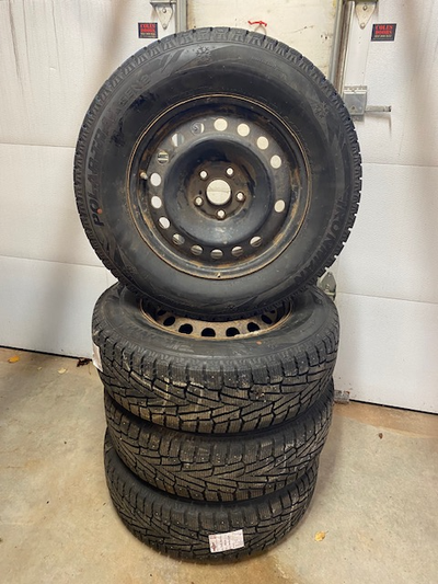 17" Ironman Polar Trax Studded snow tires on rims. Used 1 season. Fits Honda Pilot with 18" tires. $...
