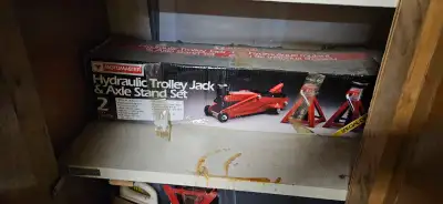 Hydraulic Trolley Jack: Stamped steel frame Cast iron wheeis Rear wheels swivel Bypass & Safety valv...