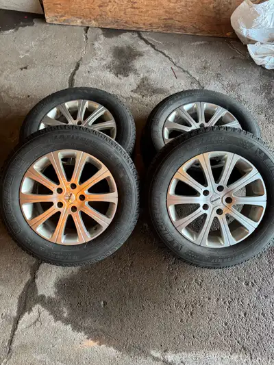 4 Michelin X-Ice Winter Tires with Aluminum Alloy Rims previously on Chevy Equinox. Used for a seaso...