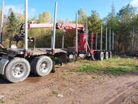 2012 kenworth and 2005 valley log trailer