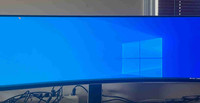 Samsung OLED 49” curved monitor. 