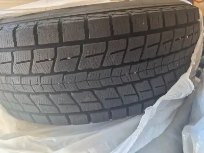 Dunlop Winter tires on rims. Size 18. Brand new last season. Had them for my Ford Edge but Im sellin...