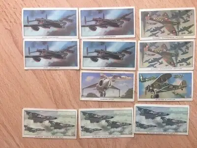 A group of vintage (almost antique) cigarette cards of British Military aircraft, with extras. These...