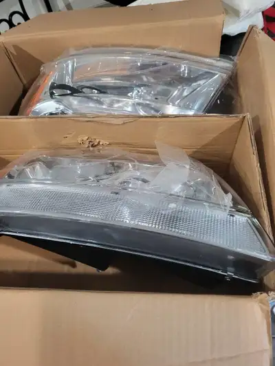 New 1999-2004 jeep Cherokee chrome amber headlight lens $160.00