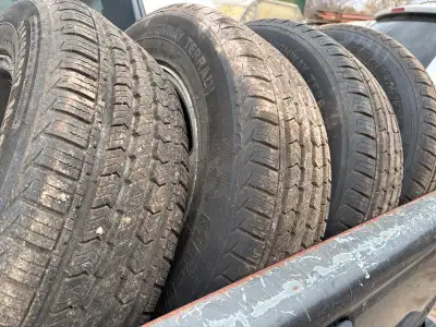 New tires 99.9% tread on Chevrolet Trailblazer rims wheels, fits GMC Envoy as well. Includes tpms se...