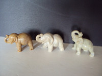 3 SMALL CARVED STONE ELEPHANTS