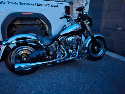 2003 fatboy, many small visual modifications, lowered rear end, 1/4 fairing, kuryaken sound bar, 98"...