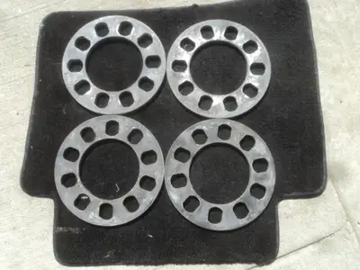 4 wheel spacers are for sale. 5X115 mm. 7 mm thick, center hole is 3.5 inches Please call me at 780....