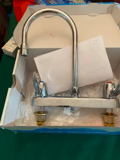 Brand new, Delta 8", center to center, Commercial Grade, Ceramic Disc Faucet for sale. It's heavy-du...