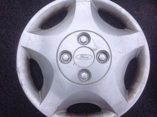 Four 14" Ford wheel covers in Tires & Rims in Annapolis Valley