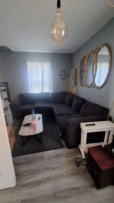 Furnished Room good location ren/board heat lights etc included.