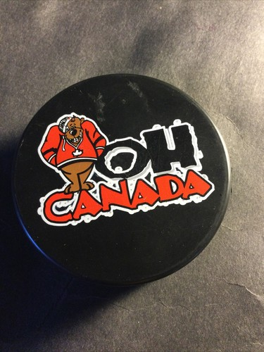 Oh Canada Souvenir Hockey Puck with Bear, View more