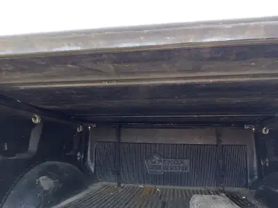 Tonneau cover for 5 foot 6 inches box ,it was on a Ford F 150,comes with mounting hardware ,its a ro...