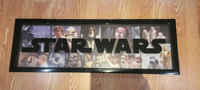 Star Wars frame. - Front is glass with "Star Wars" wording. - inside is images from the movies - Siz...