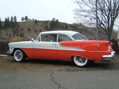 This stunning, well-maintained classic Oldsmobile Rocket is a true piece of automotive history, feat...