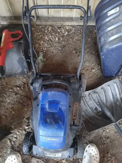 Selling a Kobalt 40V MAX electric lawn mower that comes with two batteries for extended use. This is...