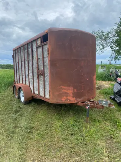 Homemade 6x12 cattle trailer, has new lights and suspension, 2 new wheels. Tows great and works as i...