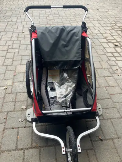 Chariot Stroller with 3 covers, double size and baby sling. Good condition. Reduced $200.