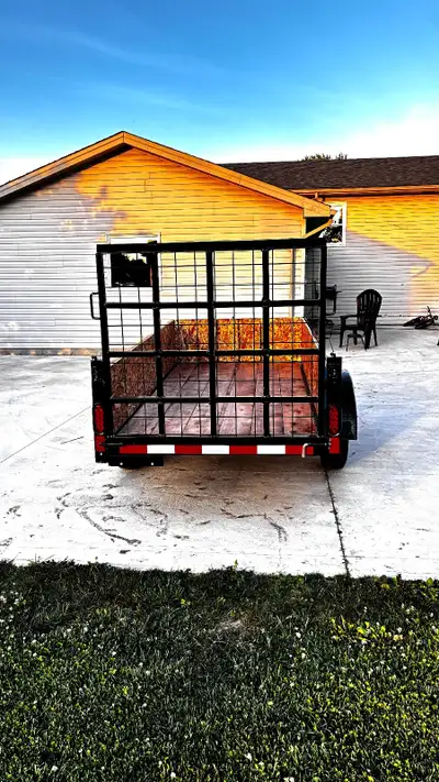 Brand new homemade single axle utility trailer. Specs. 1 ton(2,000lb) axle. 3,000lb jack. 2" ball co...