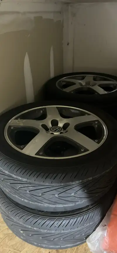 Vw montrcarlo wheels all straight no curb rash or cracks 5x100 bolt pattern 17 inch rims . Tires are...