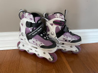 Kids size 11 -1 roller blades 