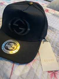 Gucci Hat with tag and sticker still on it