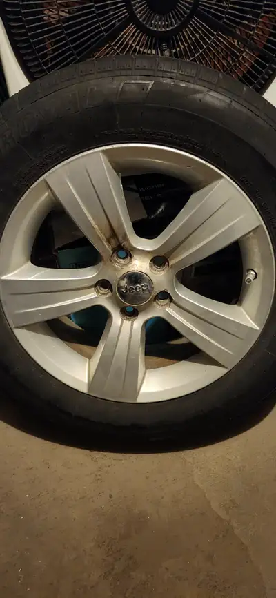 5 - 17" rims from jeep patriot Aluminum alloy, 5 rims with some good tires left, some not so good ti...