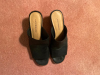 Fantastic black leather slip-on sandals.